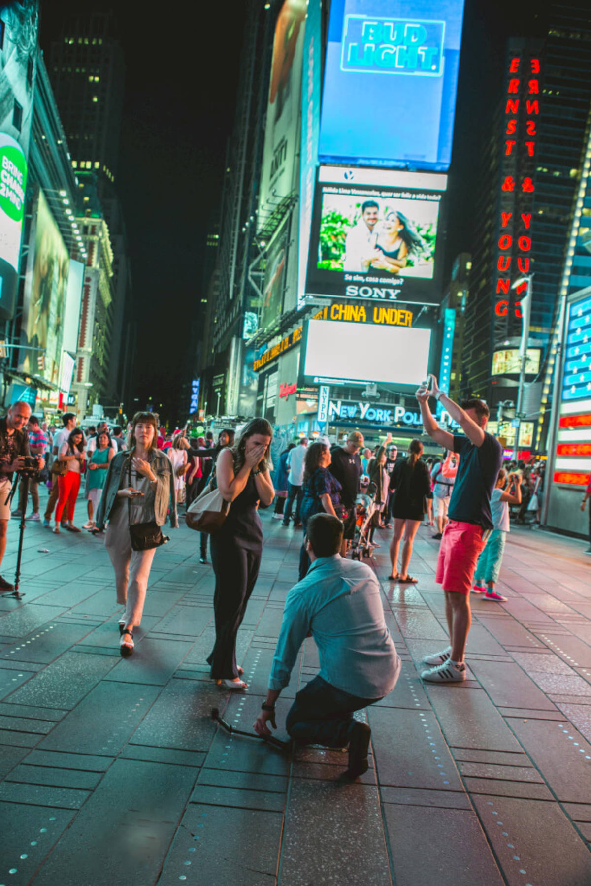 From Brazil to New York. Flávio and Nélida surprise proposal on the Times Square Billboards!