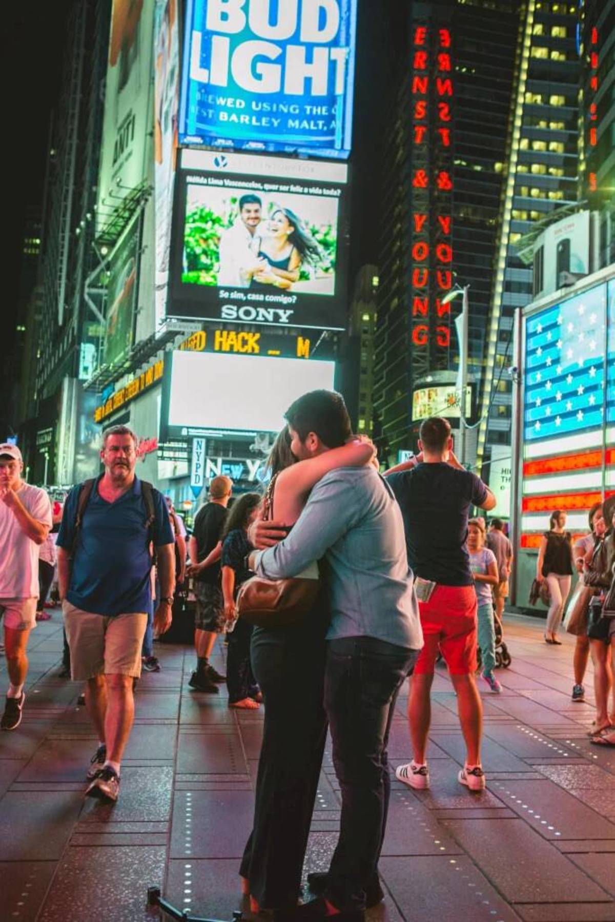 From Brazil to New York. Flávio and Nélida surprise proposal on the Times Square Billboards!