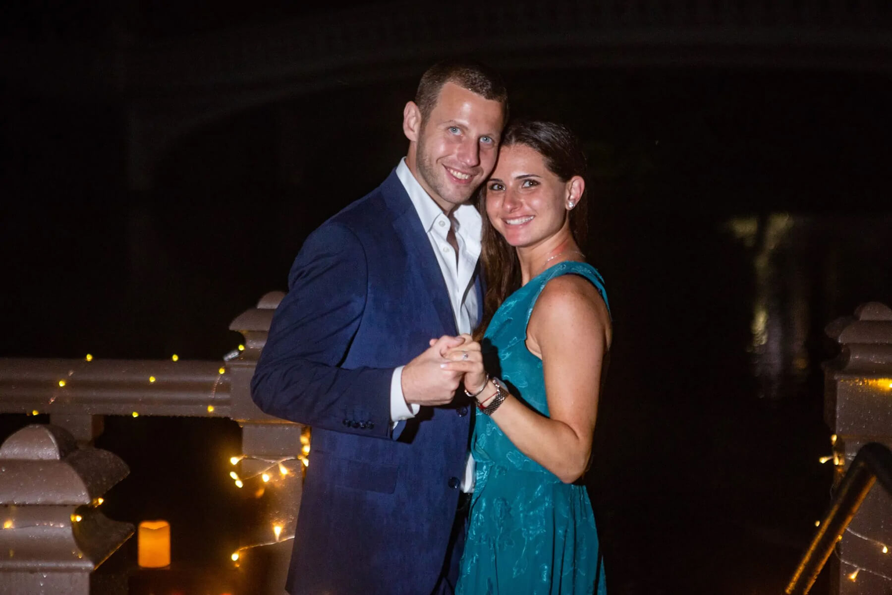 Beautiful candlelight proposal under the rain 6