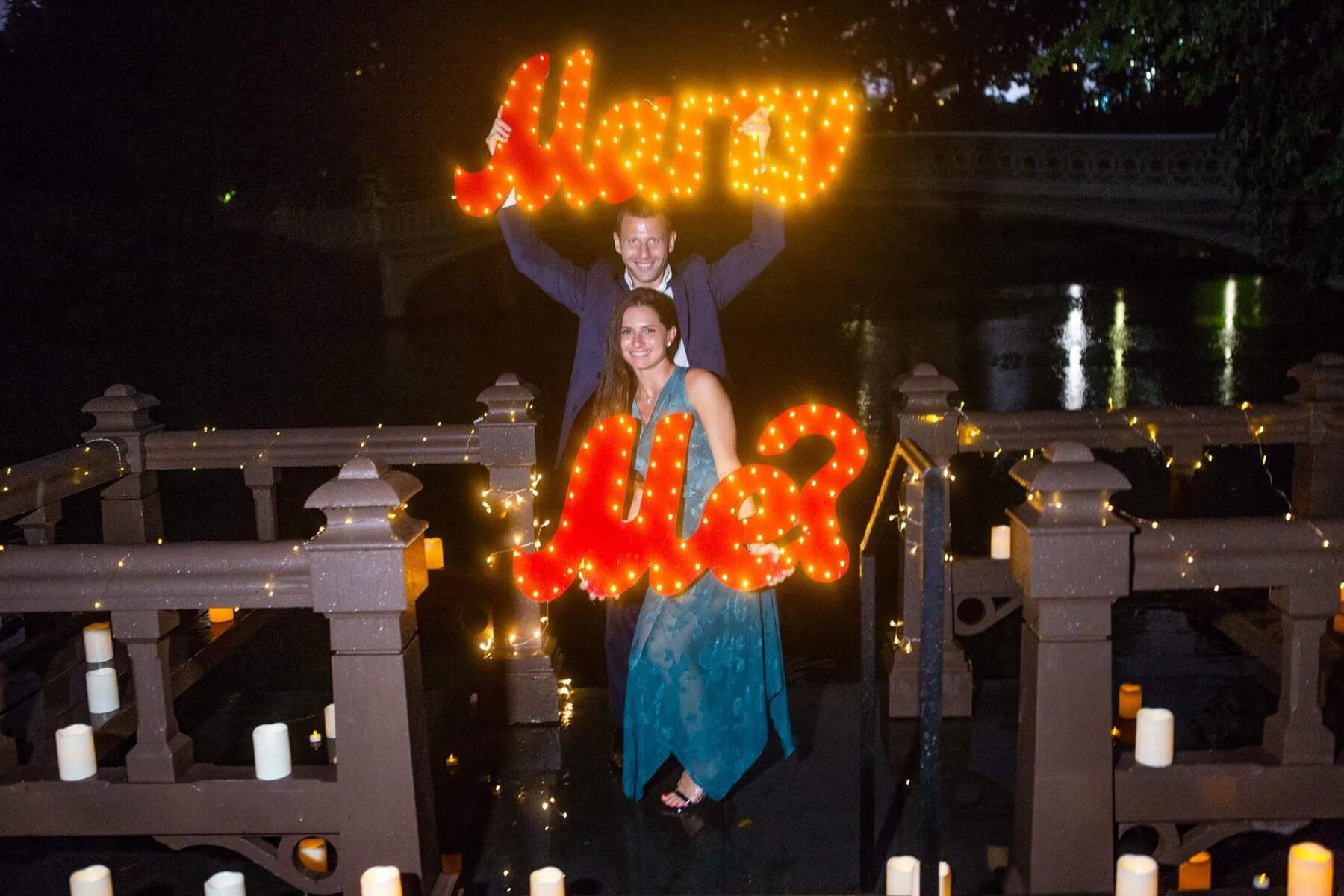 Beautiful candlelight proposal under the rain 7