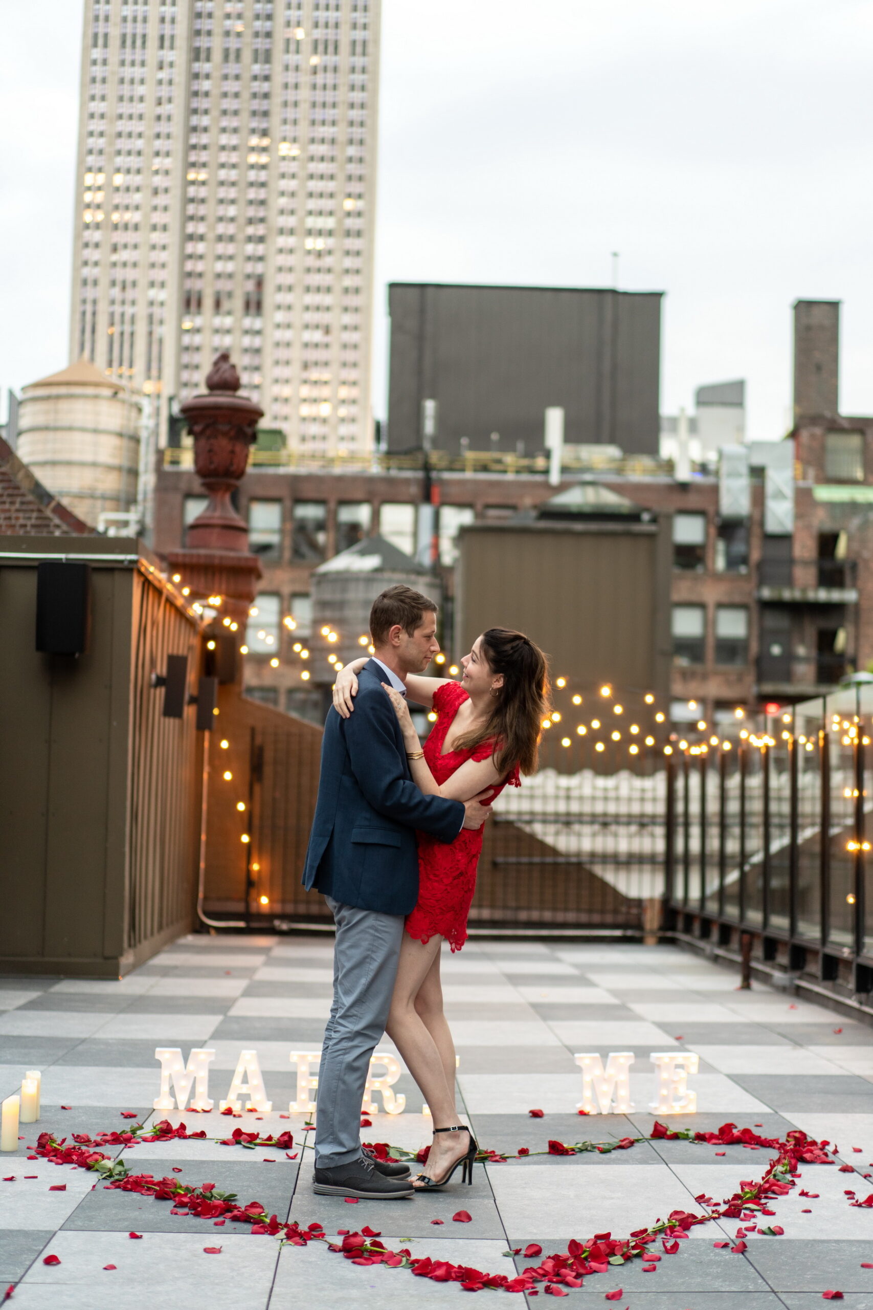 Private rooftop marriage proposal with the Empire State Building view