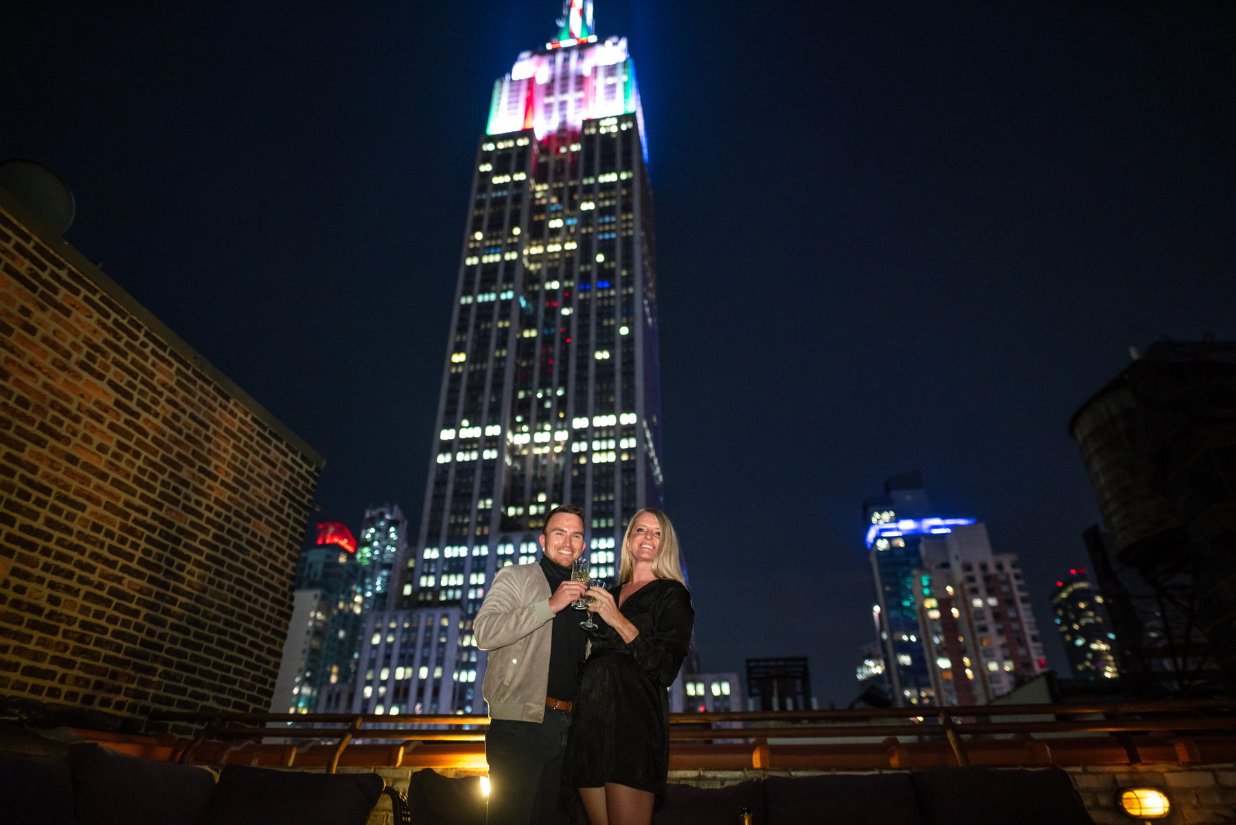 Rooftop marriage proposal with the Empire State Building view