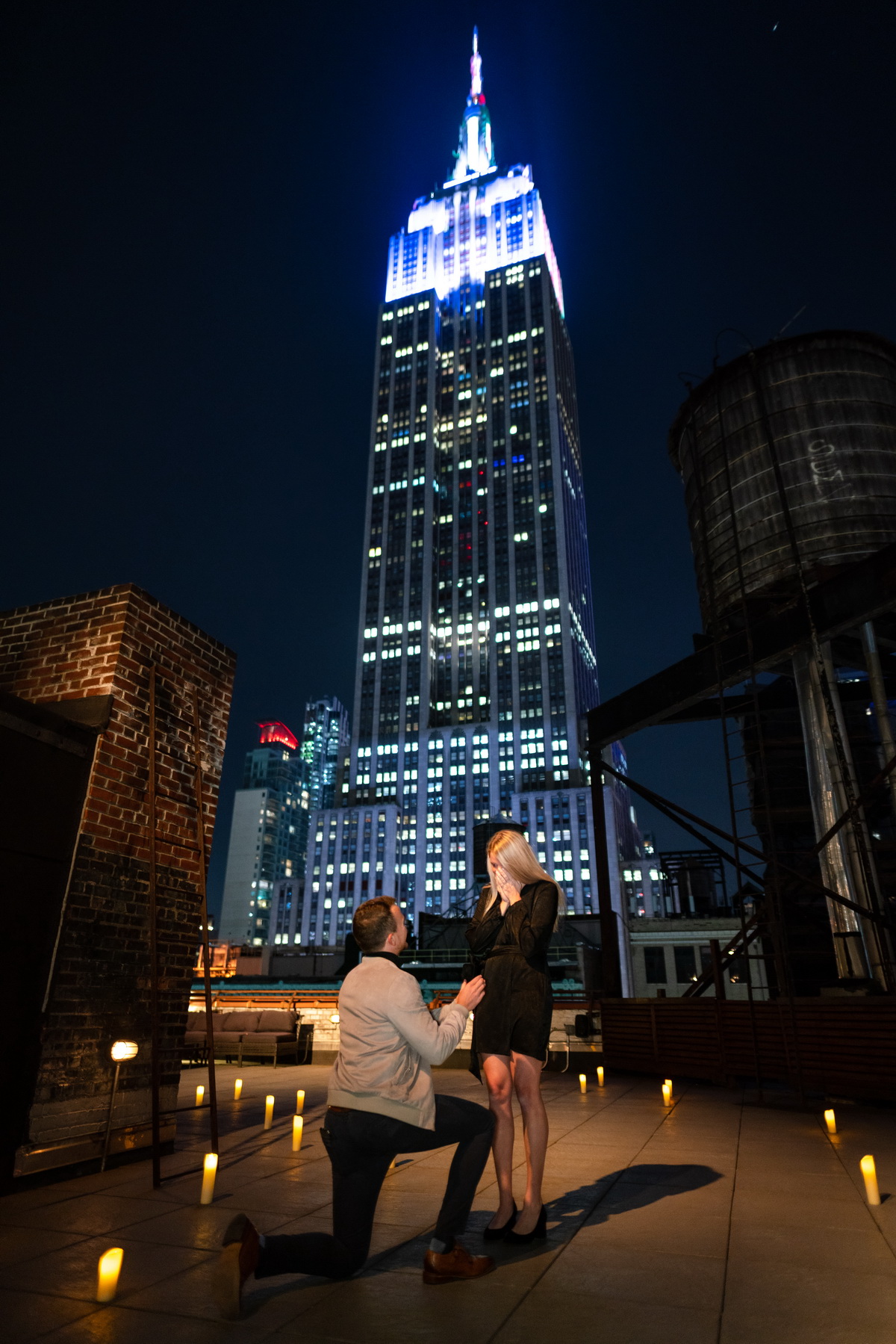 Rooftop marriage proposal with the Empire State Building view