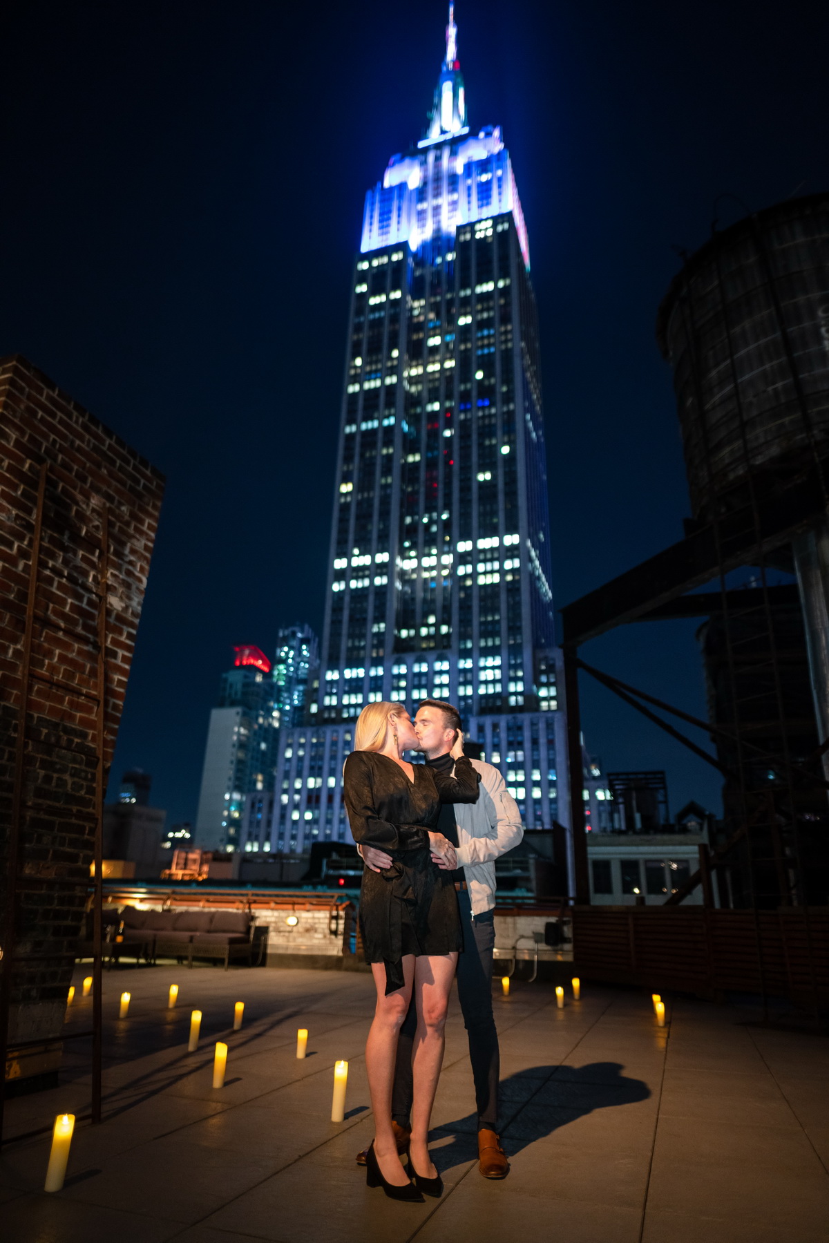 Rooftop marriage proposal with the Empire State Building view