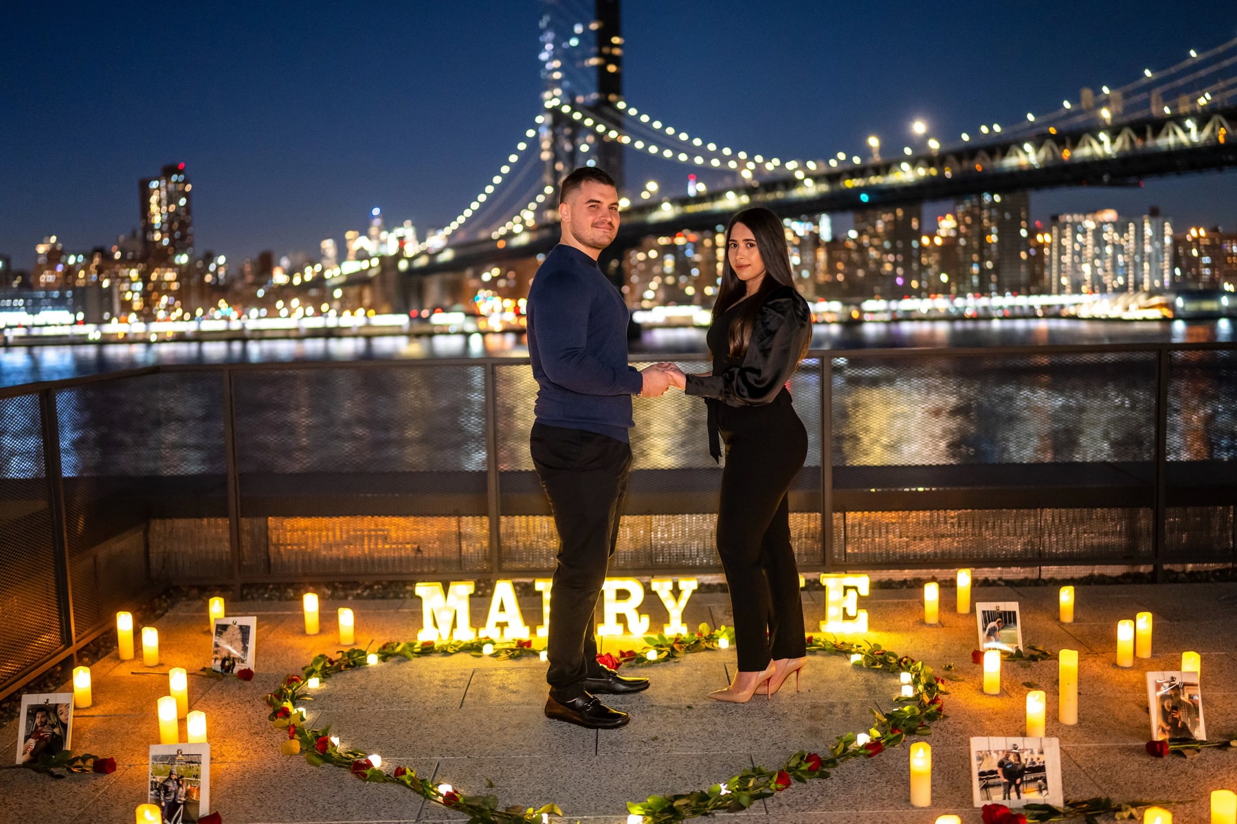 Candlelight proposal with the Brooklyn Bridge on the background