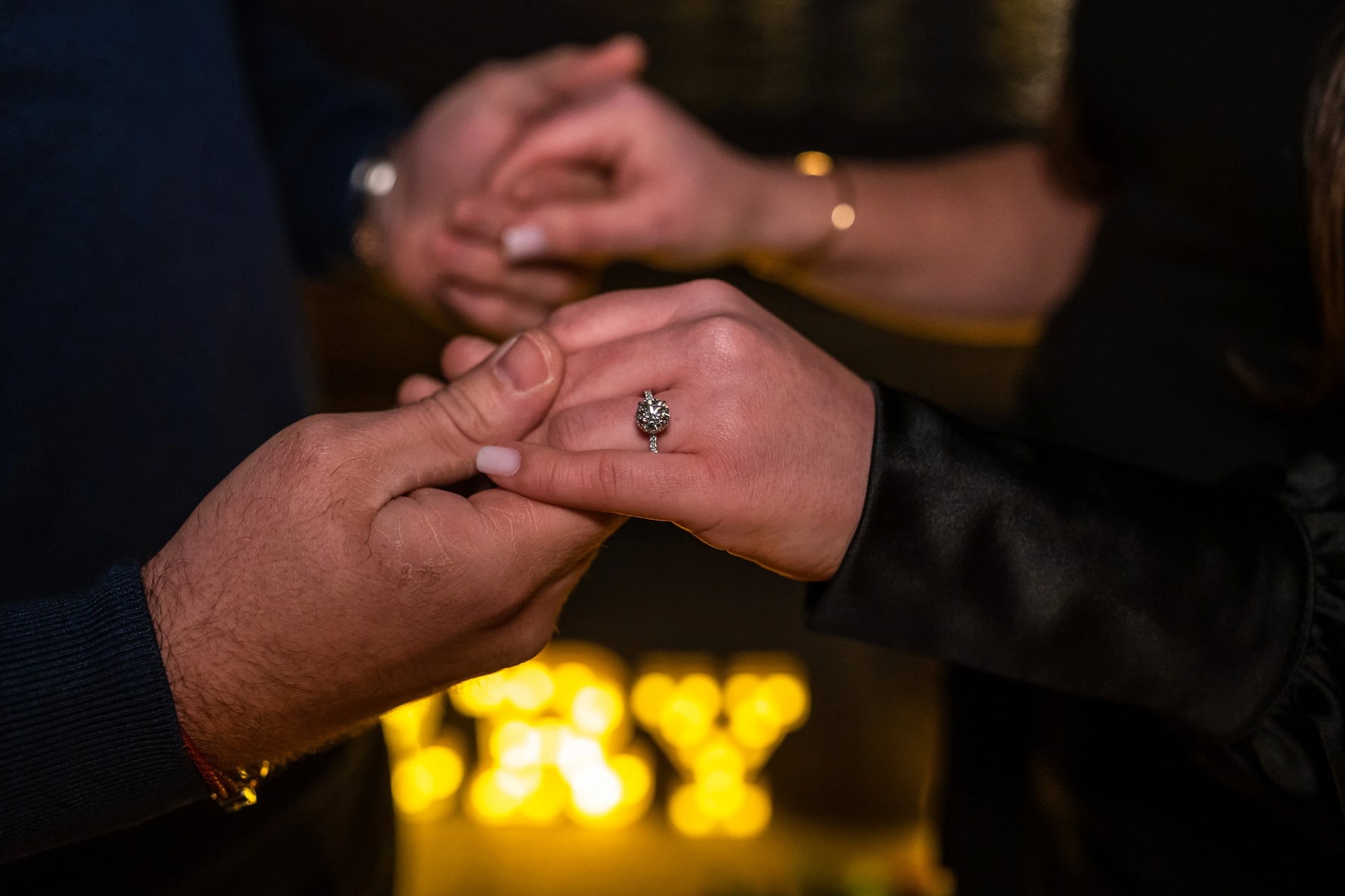 Candlelight proposal with the Brooklyn Bridge on the background