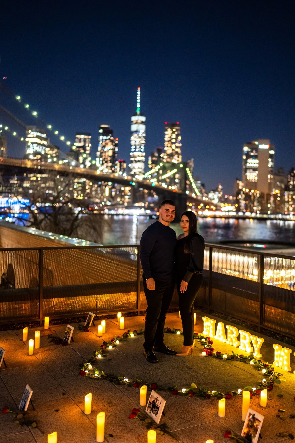 Candlelight proposal with the Brooklyn Bridge on the background