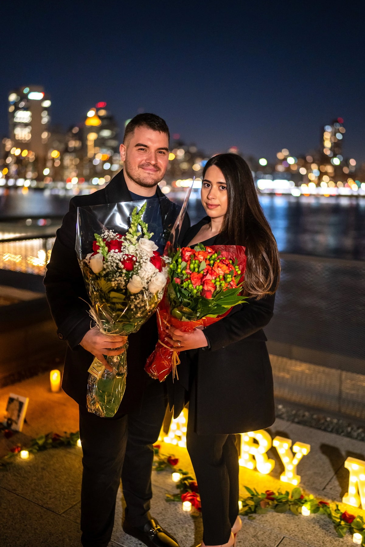 Candlelight proposal with the Brooklyn Bridge on the background