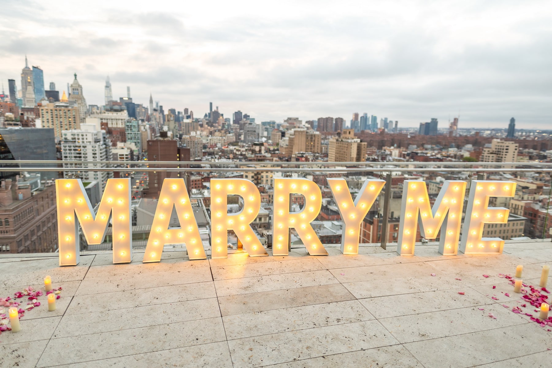 Remi and Nareh engagement on a luxury penthouse terrace in New York