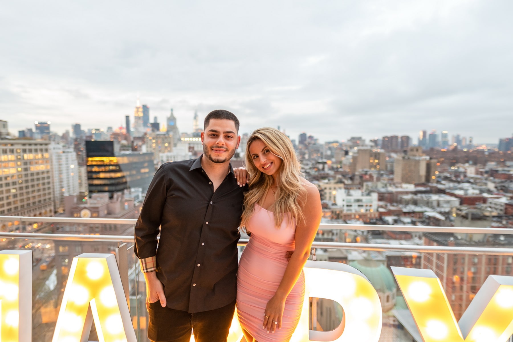 Remi and Nareh engagement on a luxury penthouse terrace in New York